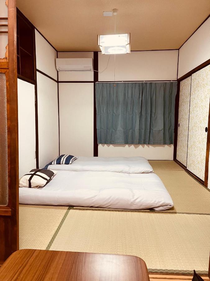 距离namba Shinsaibashi麗子民宿 Osaka Esterno foto