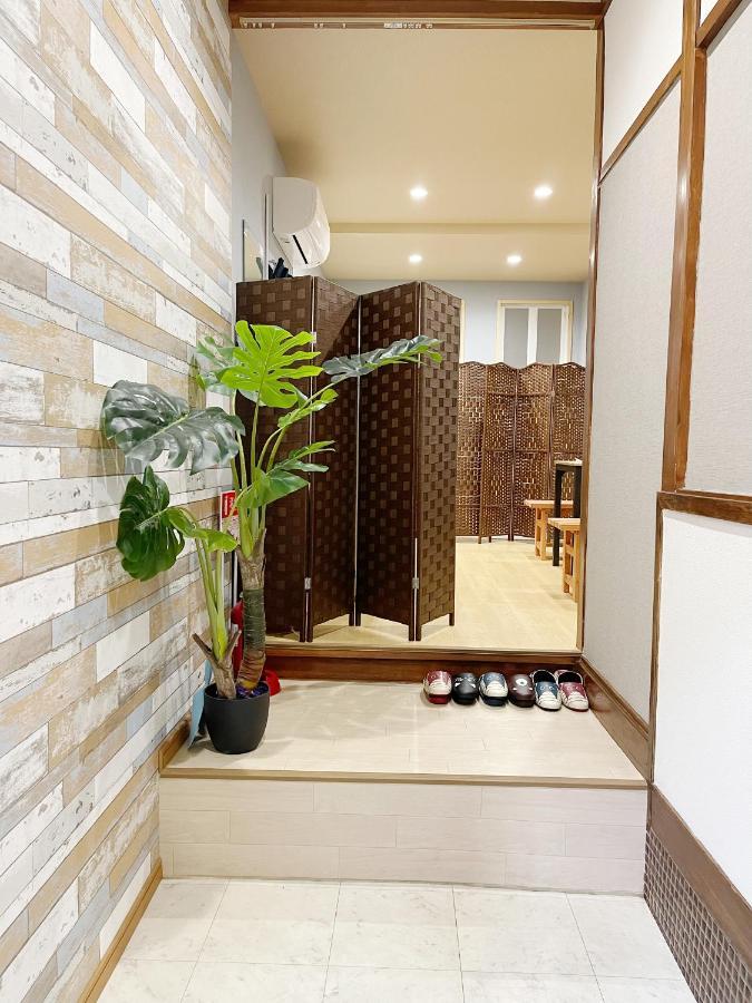 距离namba Shinsaibashi麗子民宿 Osaka Esterno foto
