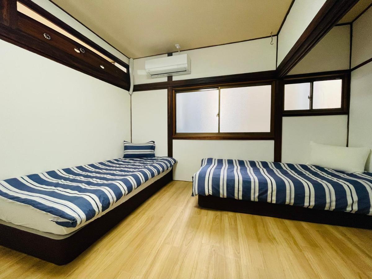 距离namba Shinsaibashi麗子民宿 Osaka Esterno foto
